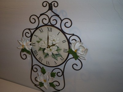 Beaitiful 18'' x  13''  Flower Theme Wall Clock With A Metal Web Design