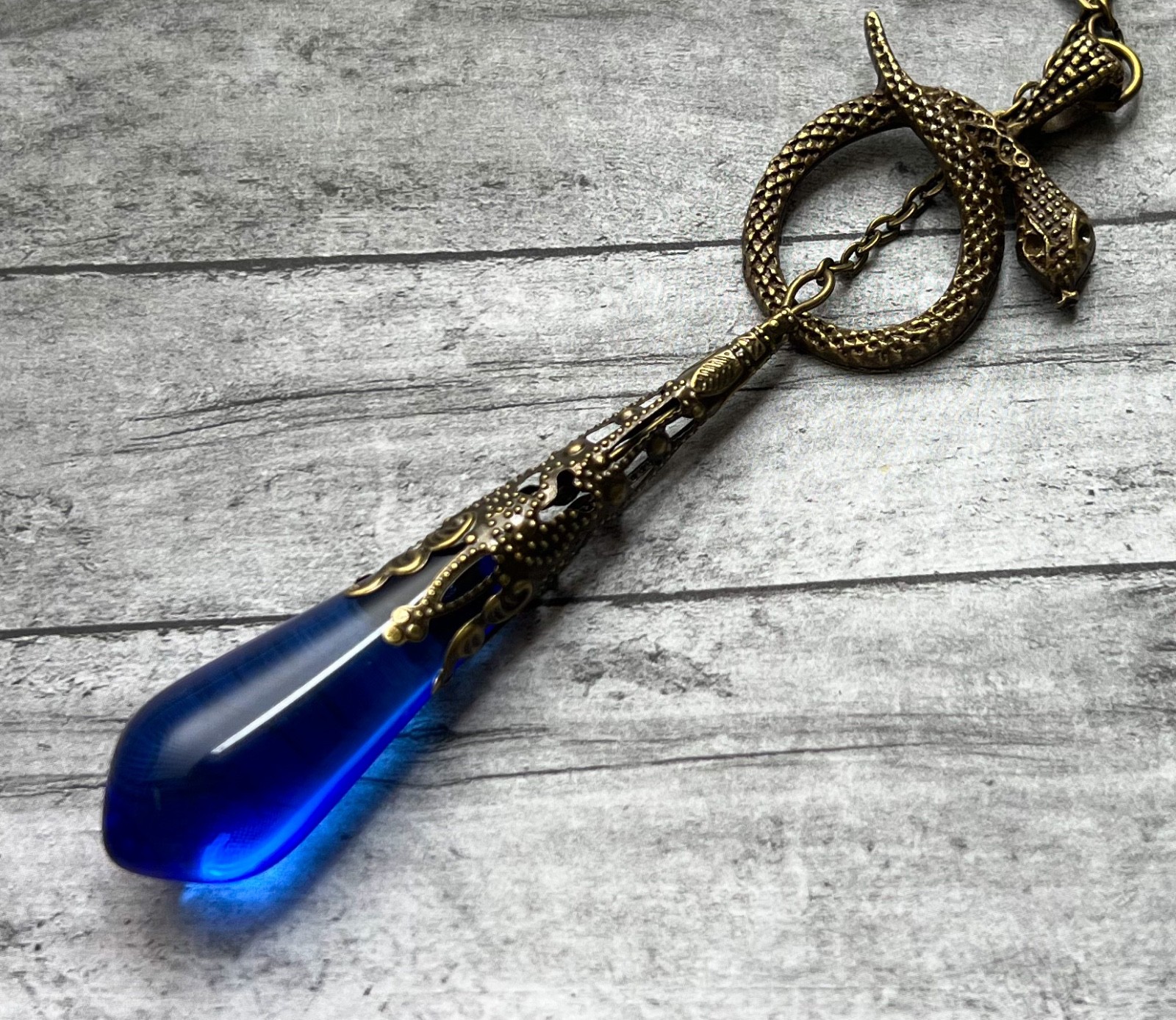 Lariat Necklace Egyptian Revival Coiled Snake Pendant Antique Blue Czech Glass