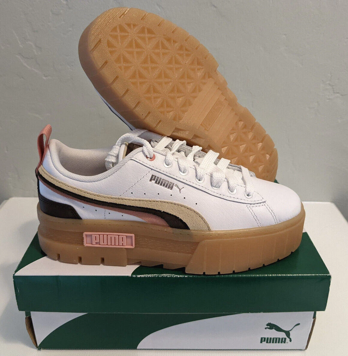 Brown and top white puma shoes