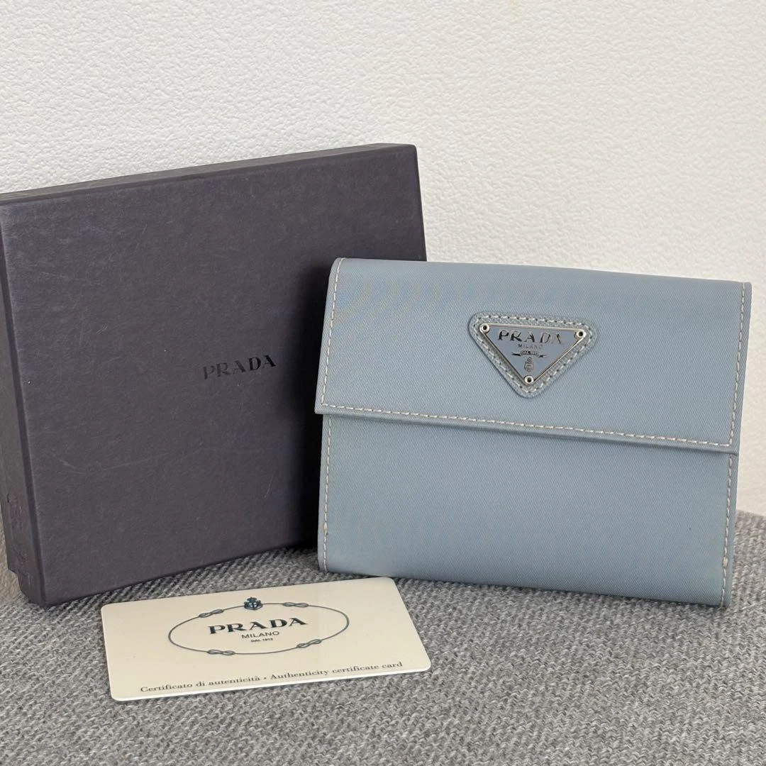 Portefeuille Prada Triangle Logo Plaque Nylon Bleu Clair 81 avec boite