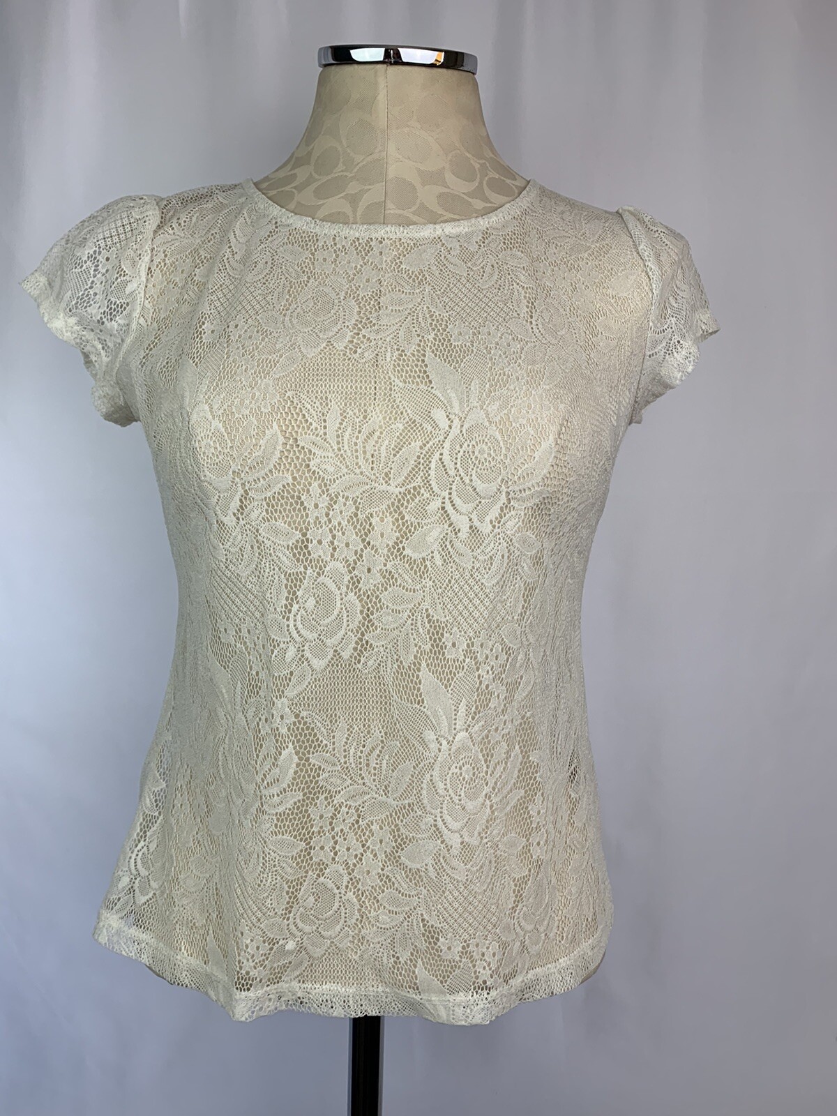 Top donna Small bar III prima fila pizzo avorio manica corta trasparente dettaglio cerniera