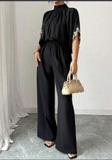 Black Wide Leg Jumpsuit.