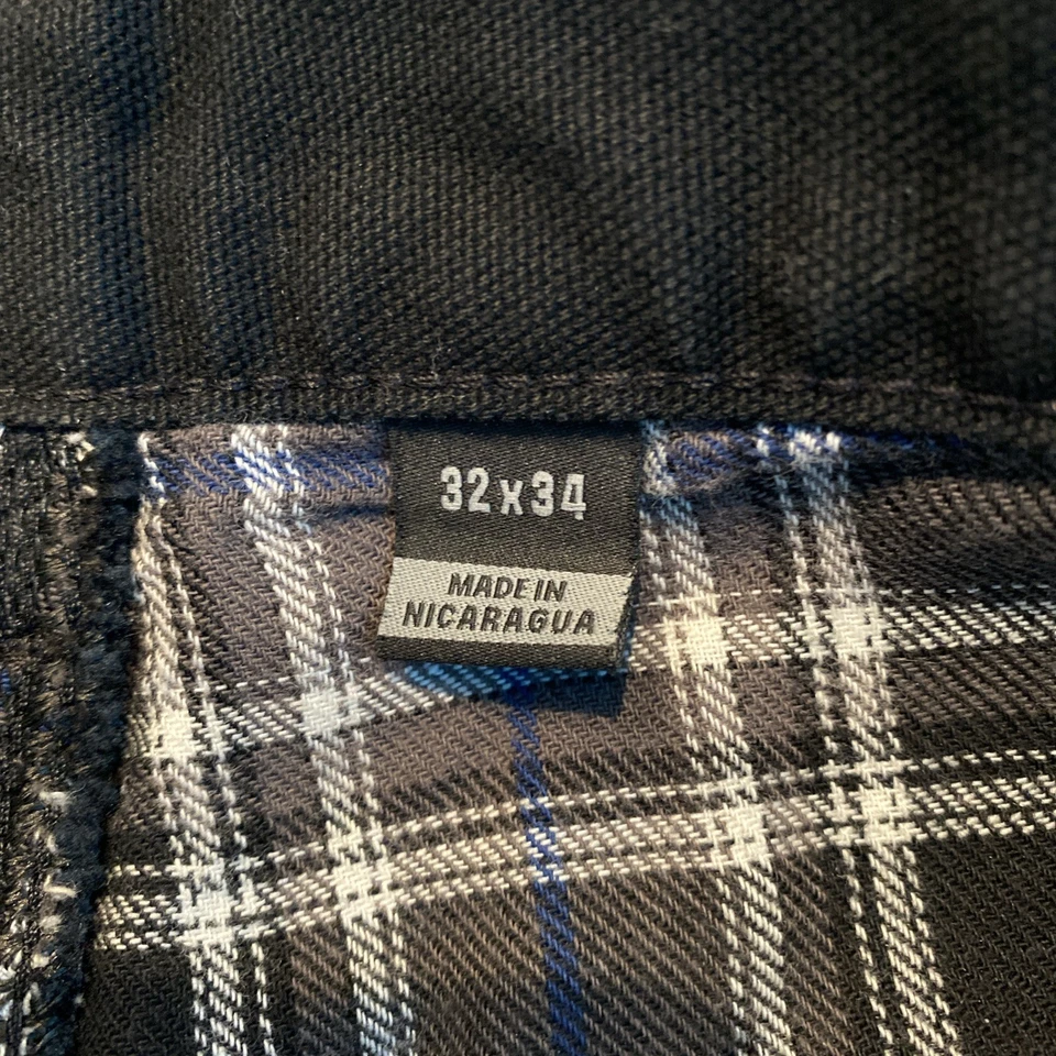 Pantalón de trabajo Carhartt Washed Duck de lona de algodón forrado en franela - Para hombre 32x34 - Negro Foto 2 de 4