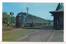 1965 - Chicago & Eastern Illinois E7 #1100 with TR92 at Cayga IN Rail Postcard