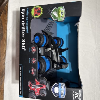 NEW Sharper Image R/C Remote Control Spin Drifter Blue Car 360 - Black Series