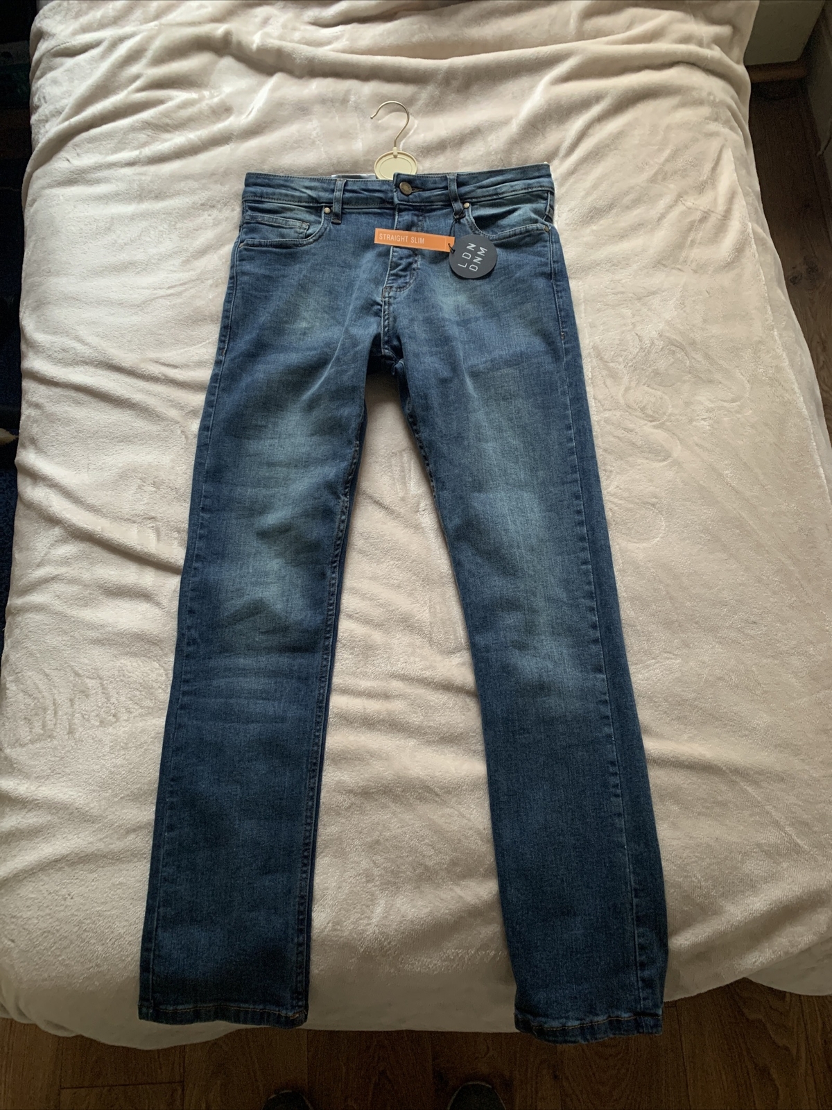 LDN DNM slim fit jeans in mid blue wash