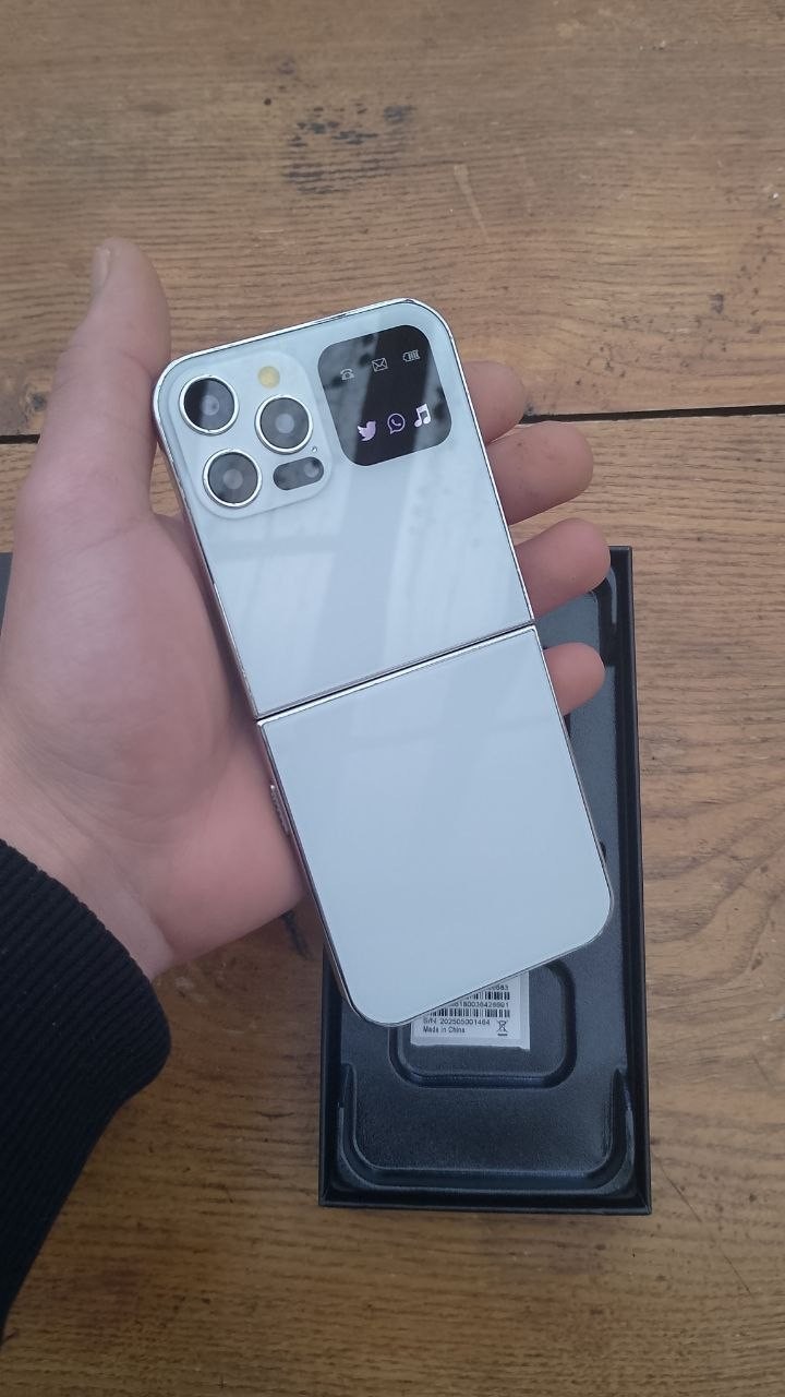 Téléphone pro à clapet anti-casse avec lampe torche et caméra NEUF