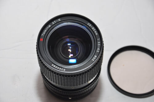 Tokina AT-X Wide-Standard Zoom 28-85mm f/3.5-4.5 MF Lens Canon FD; tested works