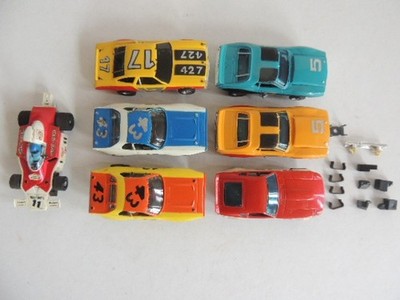 7 Vtg AFX Aurora slot car 1960-1970s Indy style 240z Mclaren Road Runner corvett