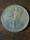 1945 p walking liberty silver half dollar a very fine coin . plus a surprise