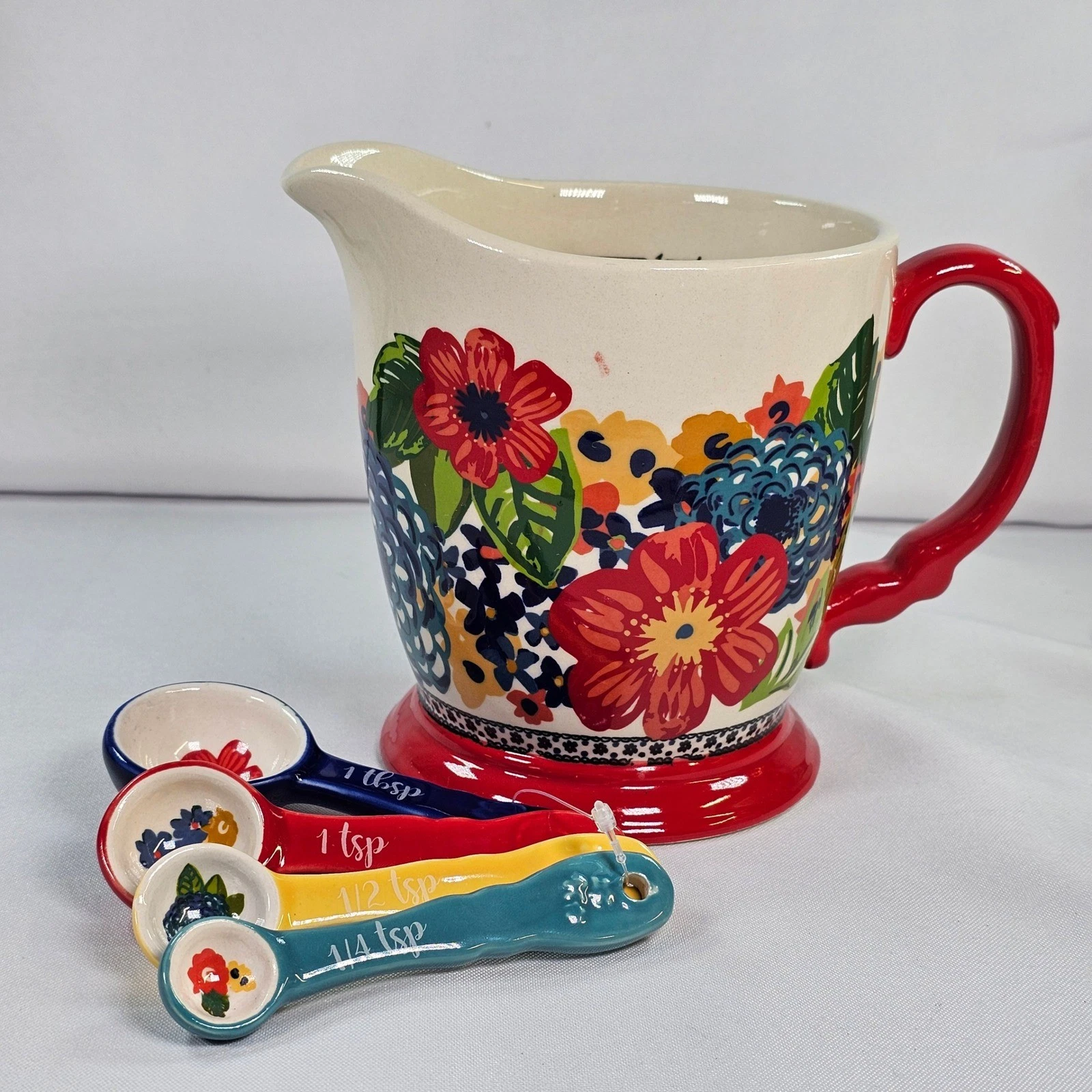 The Pioneer Woman Breezy Blossom 4 Cup Measuring Pitcher & Measuring Spoons Set
Opens in a new windo