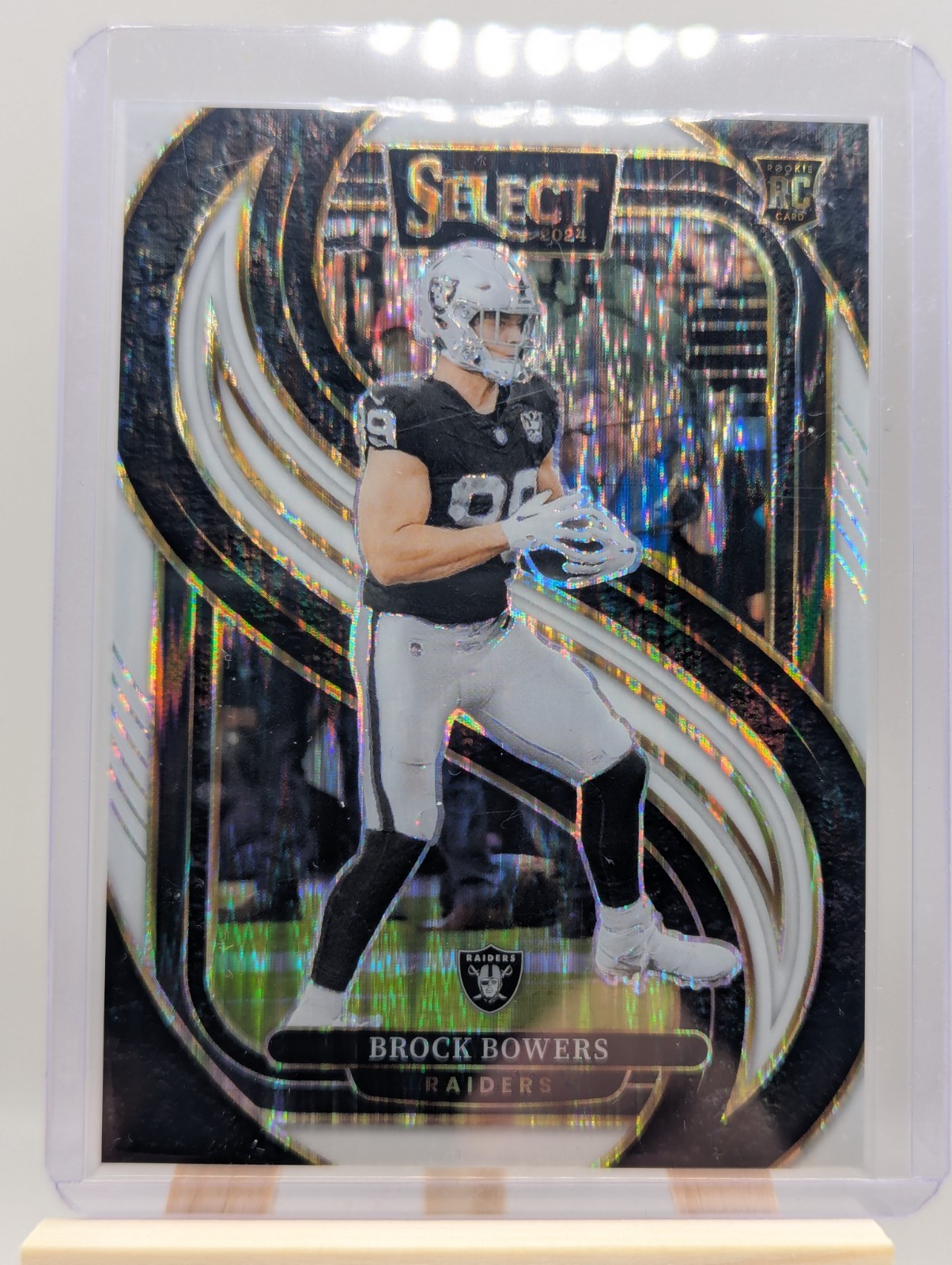 2024 Panini Select Brock Bowers #118 Premier Level White Prizm Shock /199 [RC]