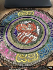 Embroidered circle piece 17”
