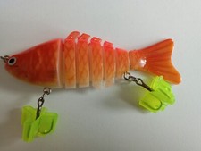 Leurre de pêche unque fat à la man pour la capture des brochets et