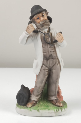 Vtg Doctor Figurine With Stethoscope and Medical Bag, In Front of 1/2 Brick Wall