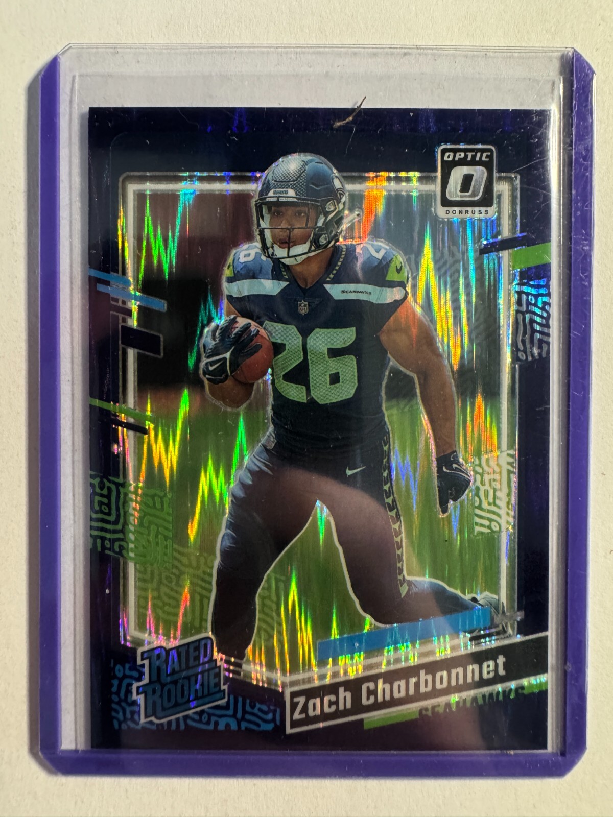 K312,215 - 2023 Donruss Optic Purple Shock #294 Zach Charbonnet RR
