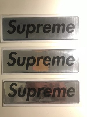 silver supreme sticker