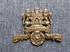 #167 – WW1 NORTHAMPTONSHIRE VTC BRONZE CAP BADGE