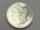 1886 Morgan U.S. silver dollar. White BU, deep flashy luster. #ea1