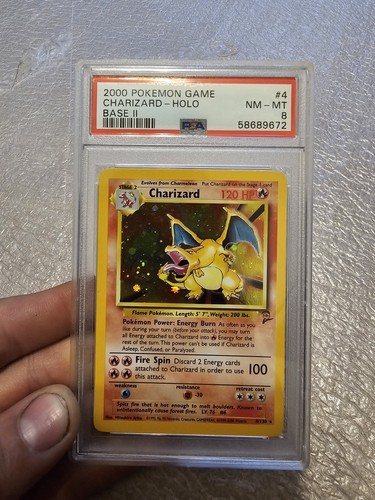 Pokémon Base Set 2 Charizard #4/130 Holo Rare Swirl PSA 8 NM-MT