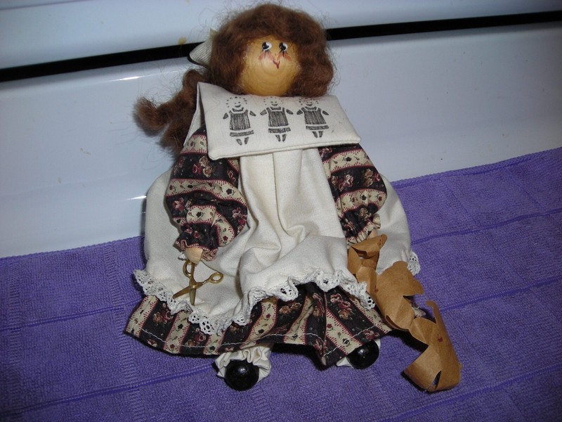 Cloth and Wood Doll with chain of  paper dolls - new