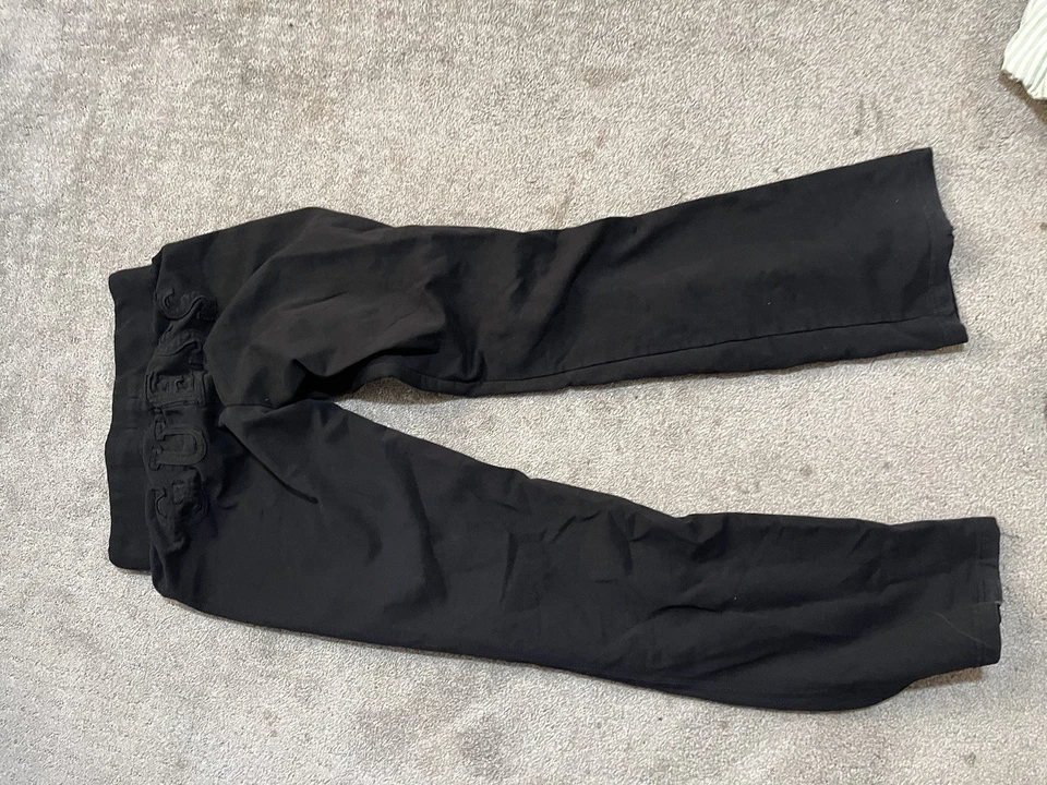 Pantalones deportivos para mujer Guess negros talla mediana con logotipo cordón Foto 3 de 4