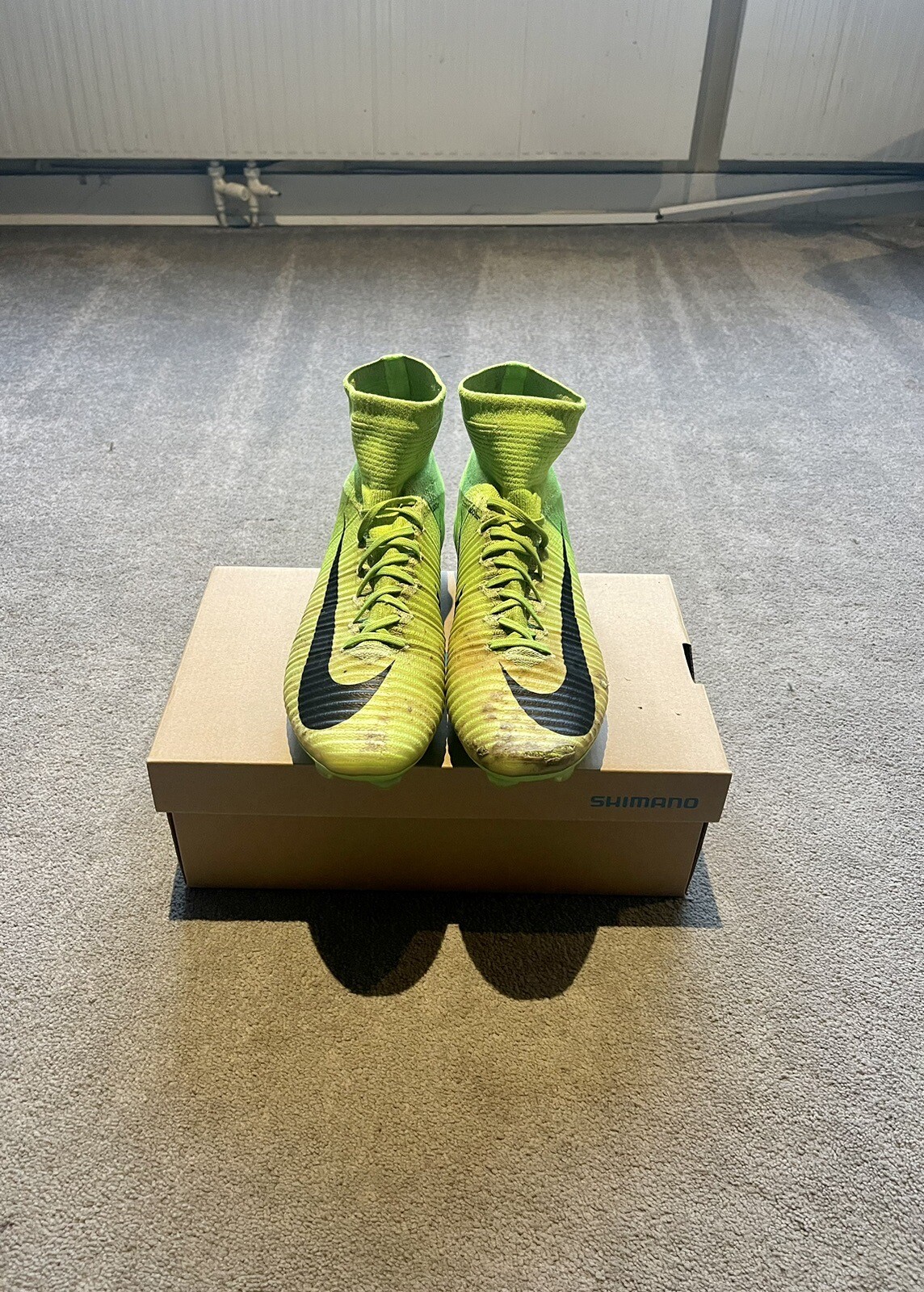 nike grey and green football boots