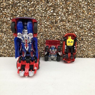 3 x verschiedene Transformer Figuren Konvolut - Go-Bots Optimus Prime & mehr *lesen*