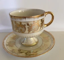 Antique Gold and Opal Footed Tea cup and Saucer made in Japan