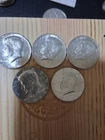 1964 UNC. Kennedy 5 90% silver half dollars