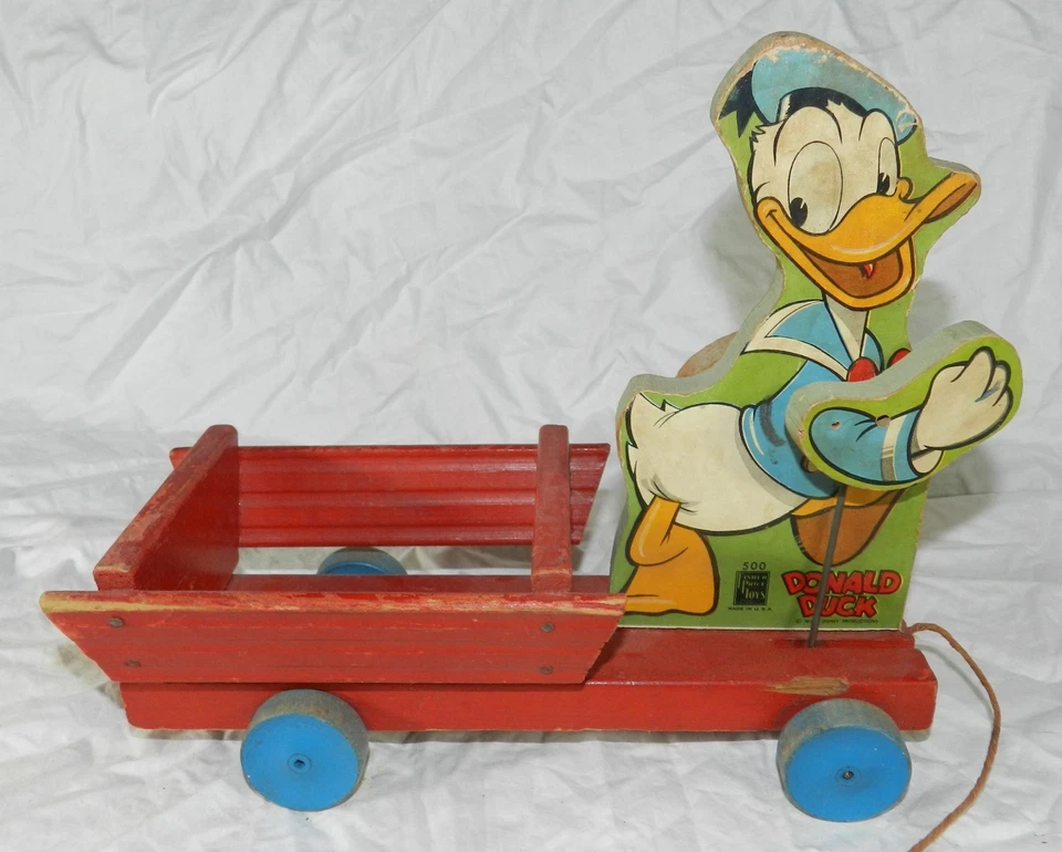 Carro de juguete Fisher Price #500 Walt Disney Donald Duck Pull de colección - brazos móviles Foto 3 de 4