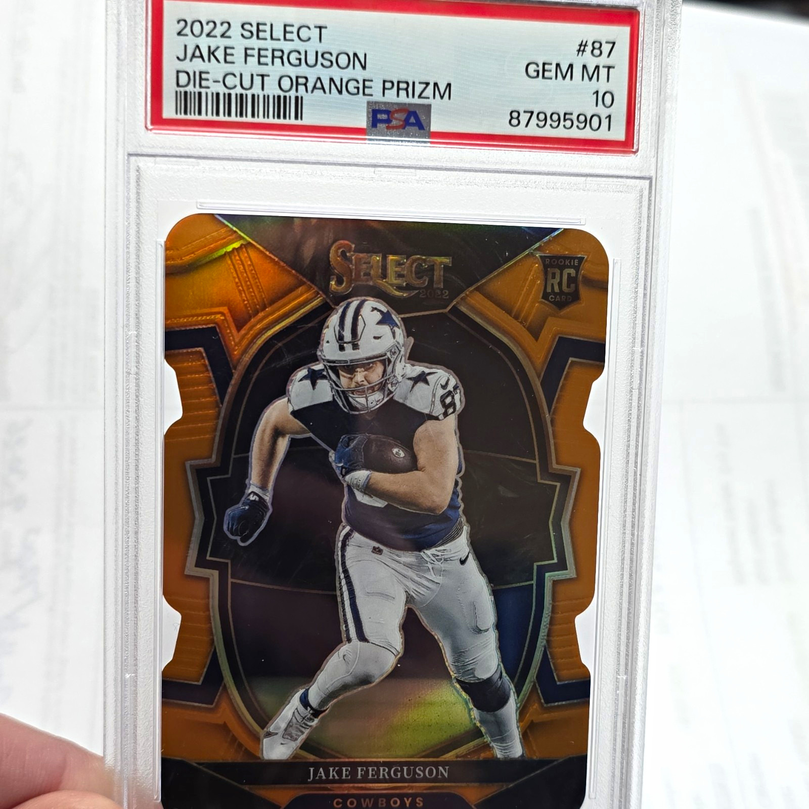 Panini 2022 Select Jake Ferguson #87 Orange Prizm Die-Cut RC /199 PSA 10