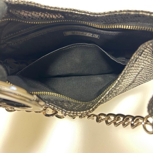 Sac à menottes motif python Cuffz by Lint émail noir rare clé incluse bon - Photo 13 sur 14