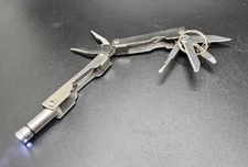 Multi-Tool - Pliers Flashlight 4 Blades Carrying Case w/ Belt Loop Copenhagen