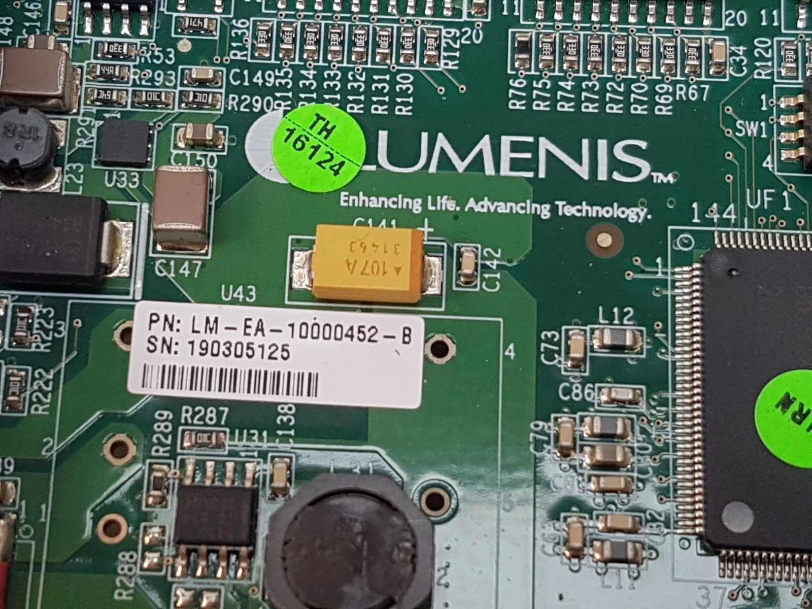Close-up of the Lumenis logo and LM-EA-10000452-B part-number label