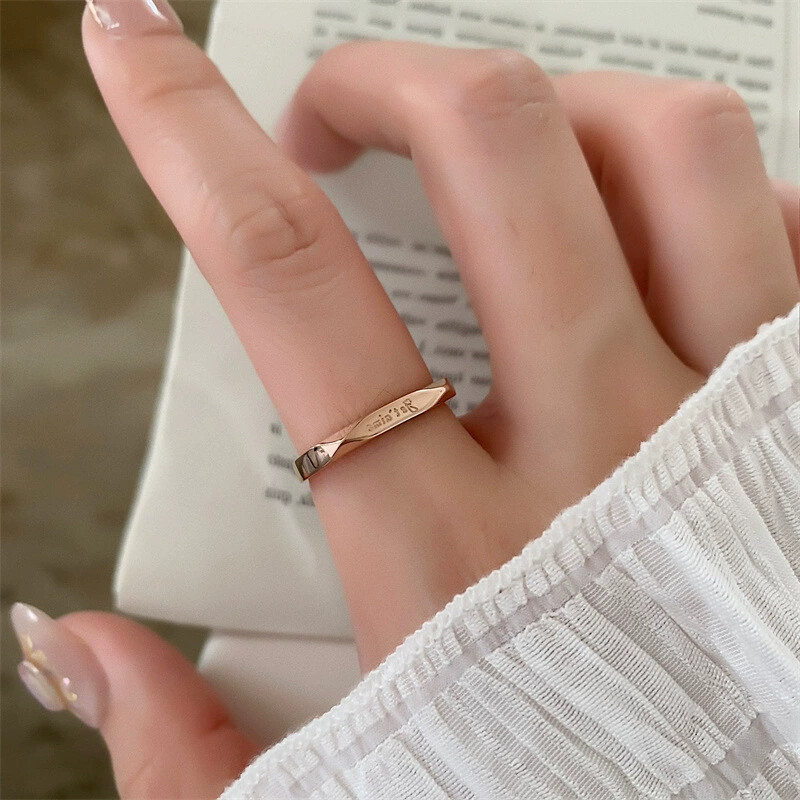 French, I love you. Simple letters, titanium steel, no fading ring