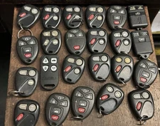 1980s 1990s GM Key Fob Remote Lot Of 23 Chevy Cadillac Pontiac Olds Buick GMC
