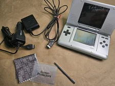 Nintendo NTR-001 Original DS Console W/ Wall And Car Chargers, Screen Protectors