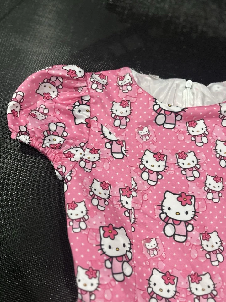 Vestido hecho a mano a lunares con lazos de Hello Kitty para niñas talla mediana Foto 2 de 4