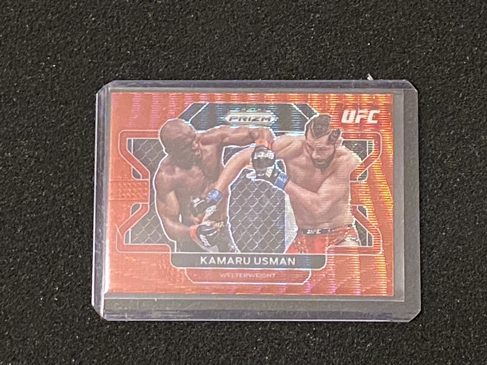 Kamaru Usman 2022 Panini UFC Prizm Ruby Wave Prizm #54 Champion