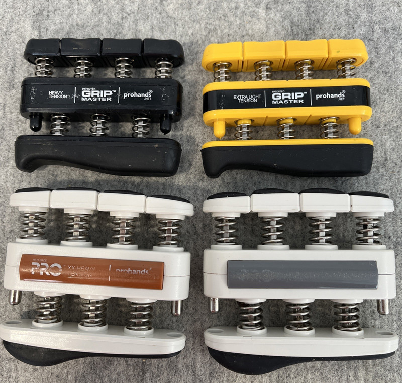 lot 4 PROHANDS by Gripmaster Hand Exercisers  XL, H,  XH, XXH Tension