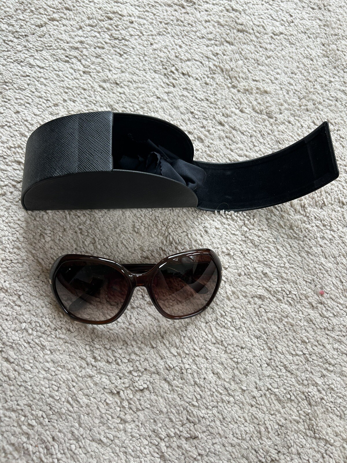 Prada Women's SPR 14N Tortoiseshell Sunglasses with Case