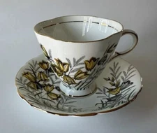 Vintage Clarence Bone China Teacup and Saucer Yellow Flower England 740/52
