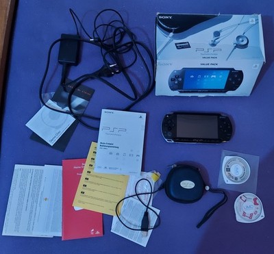 Sony Playstation Portable PSP 1000 (PSP-1004) + 2GB Memory Stick Pro Duo + Spiel