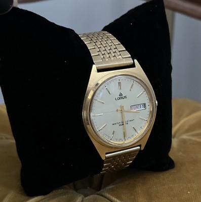 Montre Lorus ancienne Visage et bracelet dorés