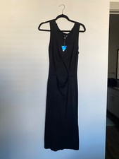 Black sleeveless cable knit vneck dress with flattering stomach cutout