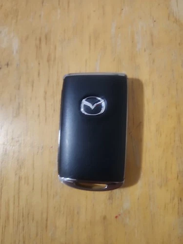 Mazda OEM Smart key  FCC ID WAZSKE13D03 - product listing photo