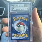 Pokémon Dragonite 1st Edition Fossil Holo Rare 4/62 CGC 8 1999 Card