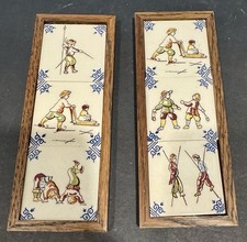 Two framed polychrome Group Of 3 Delft tiles from the "Children Playing" series