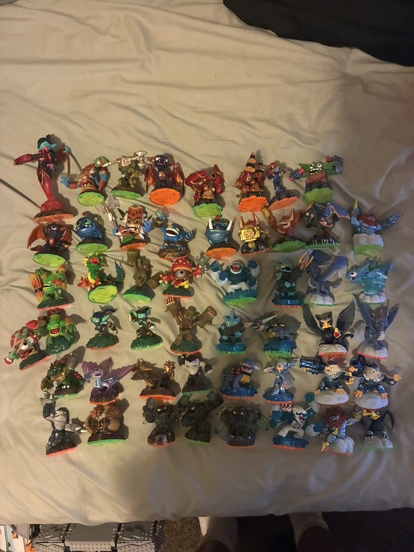HUGE Skylanders Lot of 50 - Including Case, Books, Cards, and portal stand 